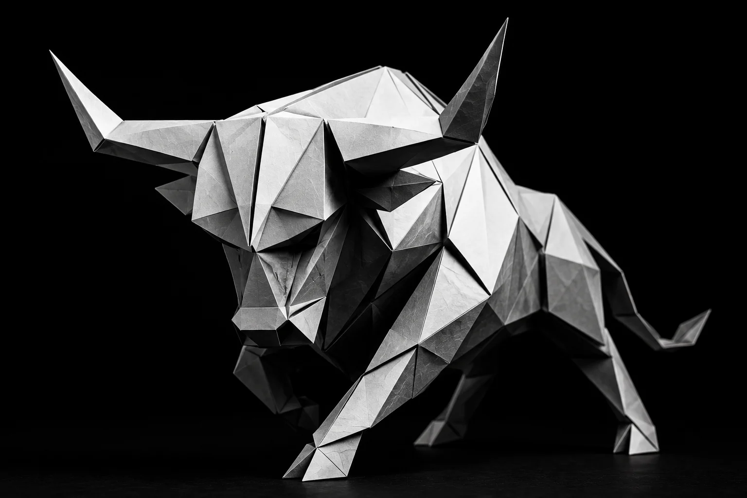 Monochrome origami bull symbolizing momentum and growth for businesses evaluating whether they are ready to launch a lead reactivation campaign